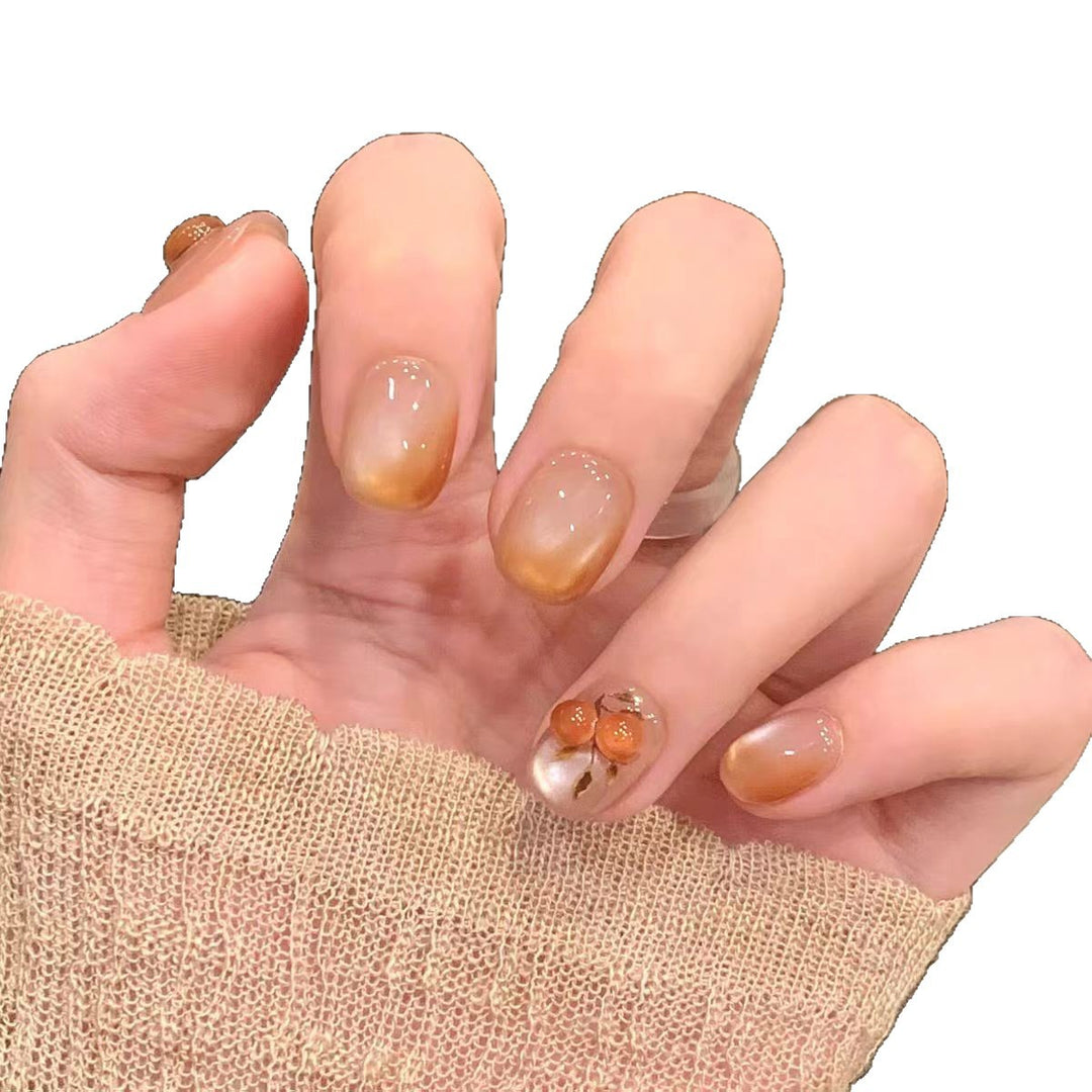 Artificial nails with elegant ombre effect and floral accents Bowlift