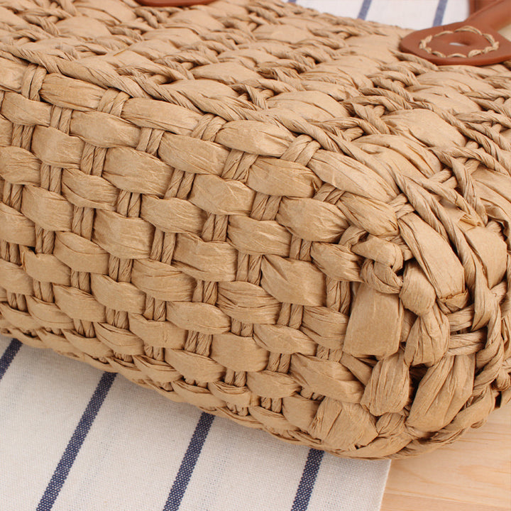 Handcrafted wicker bag with elegant leather accents Bowlift