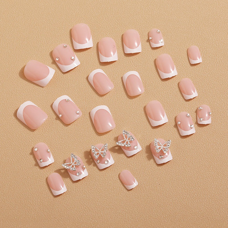 Artificial nails with elegant butterfly embellishments Bowlift