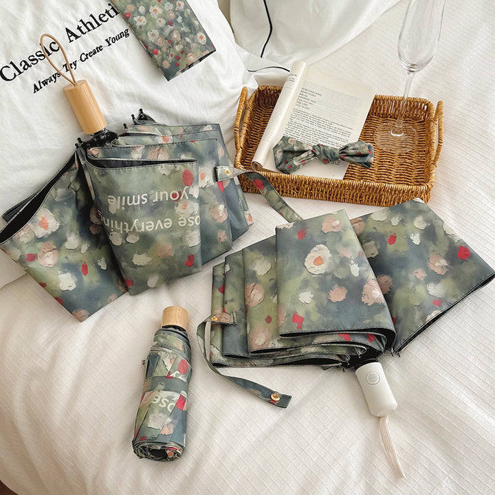 Ladies Folding Umbrella with Floral Design Bowlift