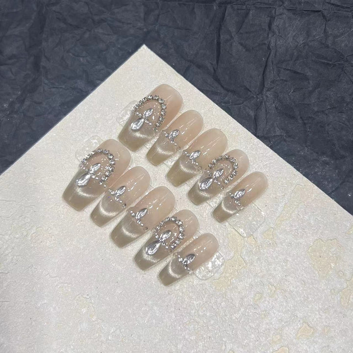 Elegant Press-On Nail Set with Rhinestone Detailing Bowlift