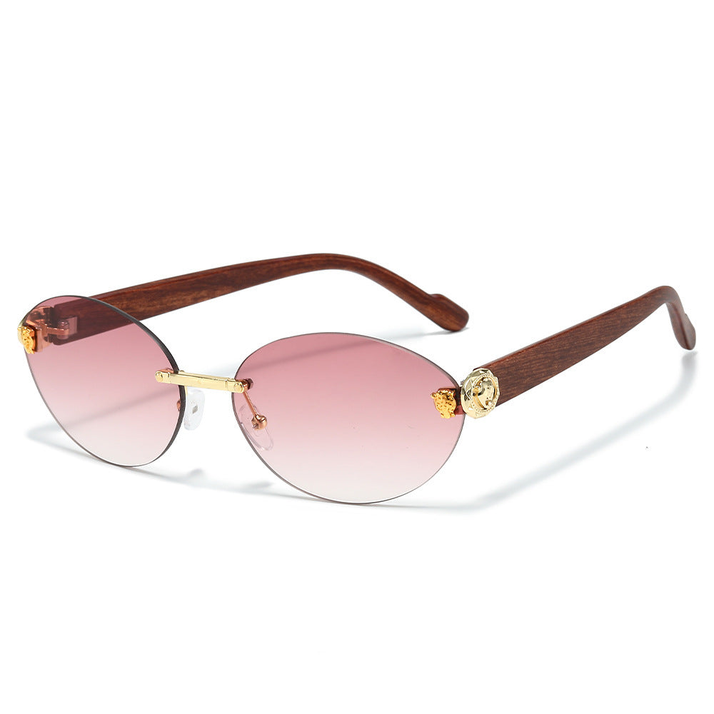 Designer Oval Frame Sunglasses with Decorative Accents Bowlift