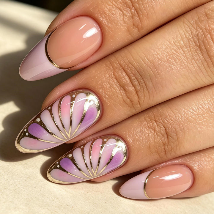 Artificial nails with luxurious gold edge and filigree design Bowlift