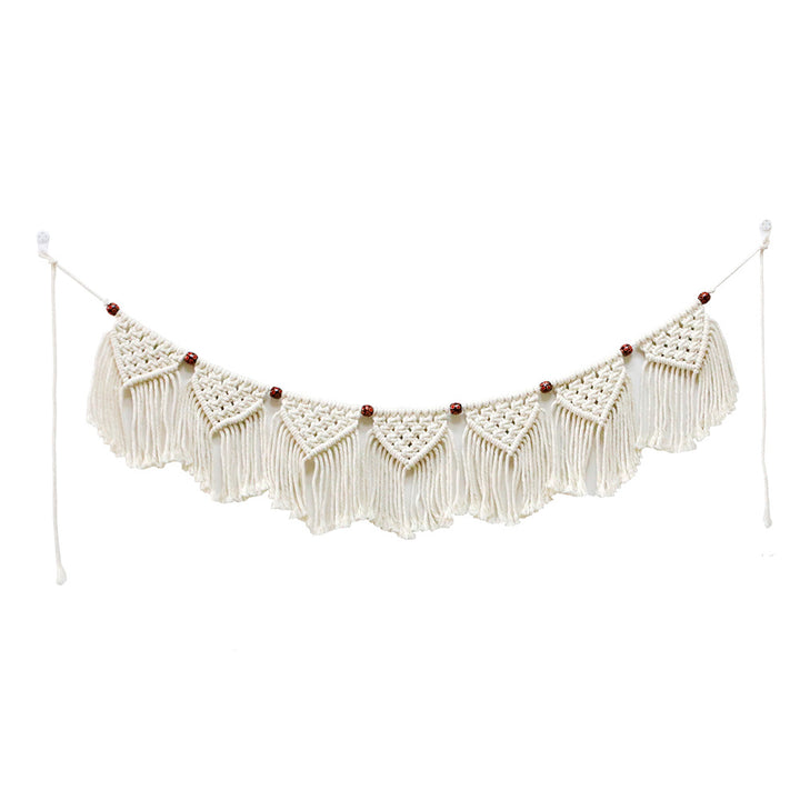 Decorative macrame wall hanging with ornate fringes