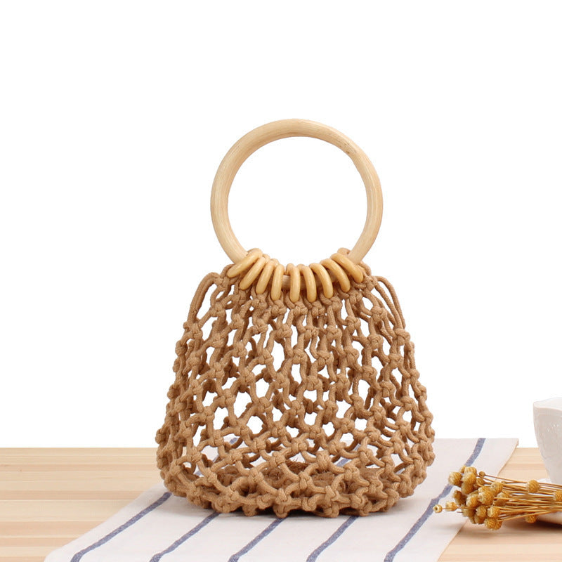Tote bag with hand-knotted net design and wooden handle Bowlift