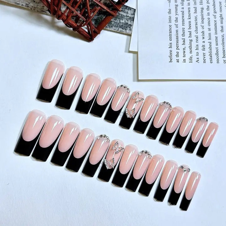 Trendy artificial nails with delicate rhinestone and butterfly accents Bowlift