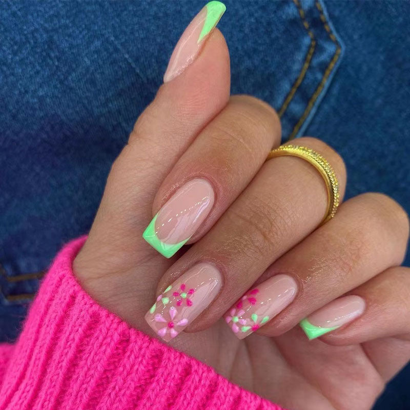 Artificial nails with floral accents and neon tips Bowlift