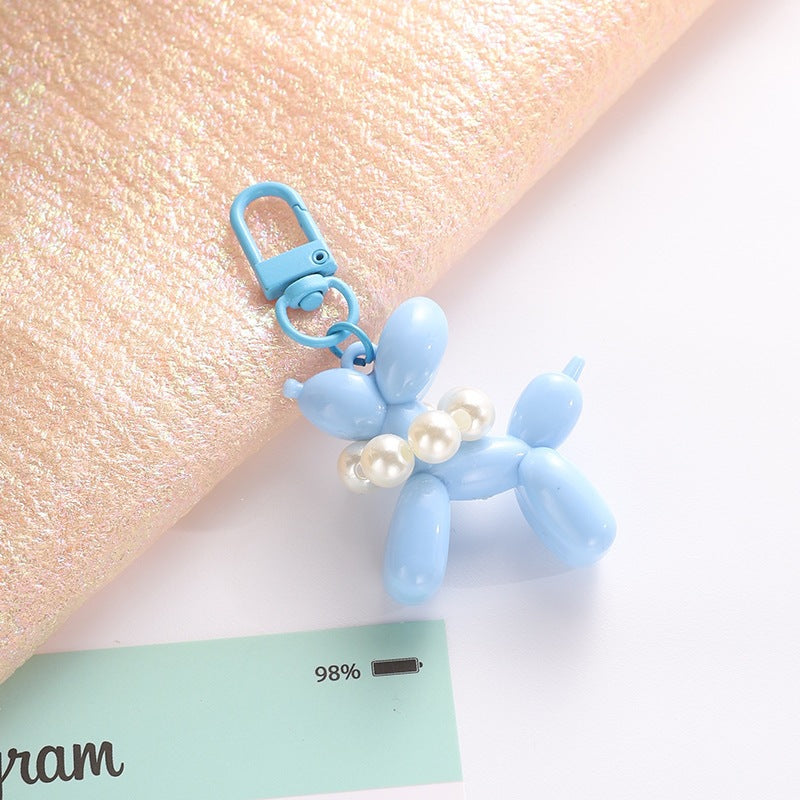 Playful keychain with balloon dog and beads Bowlift