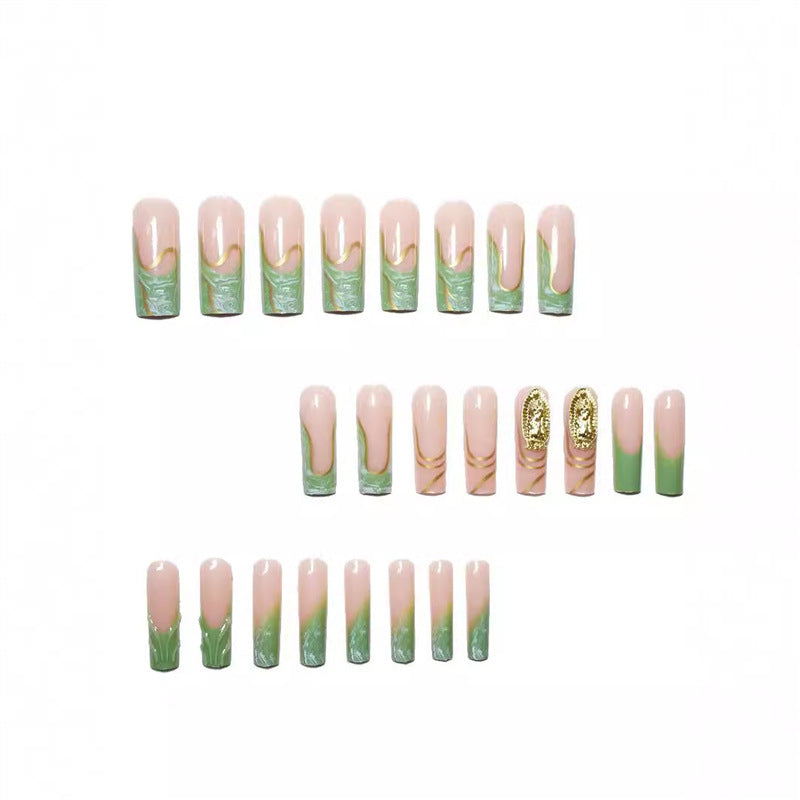 Artistic Press-On Nail Extensions with Gold Detailing Bowlift