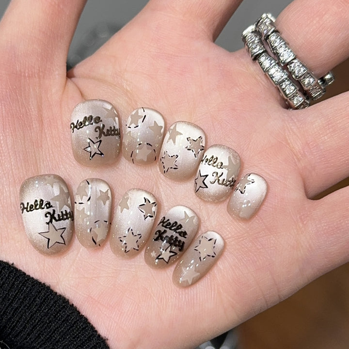Artificial nail tips with Hello Kitty design Bowlift
