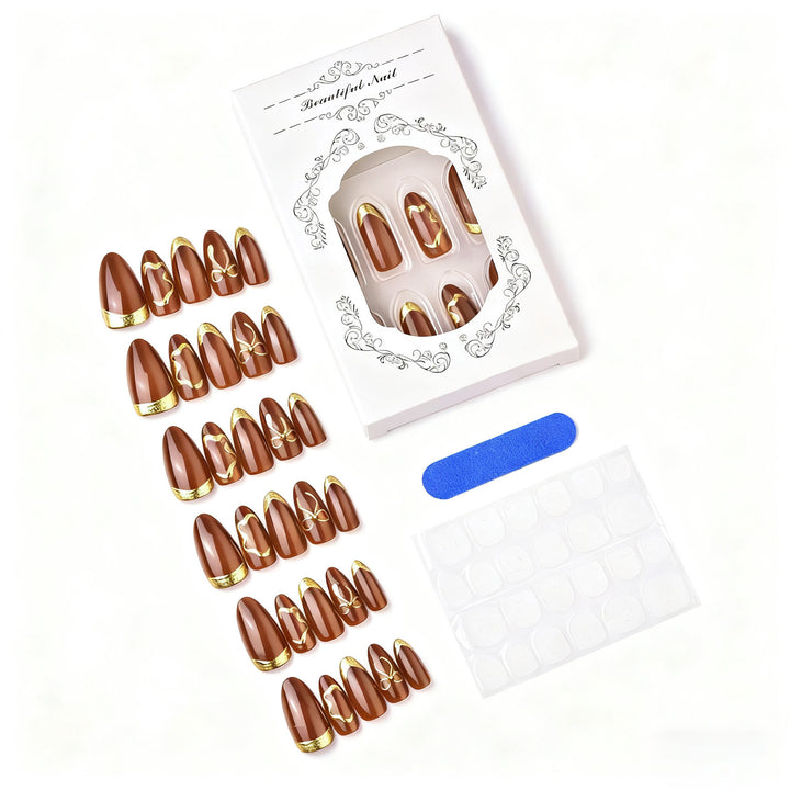 Elegant artificial nails with gold accents Bowlift