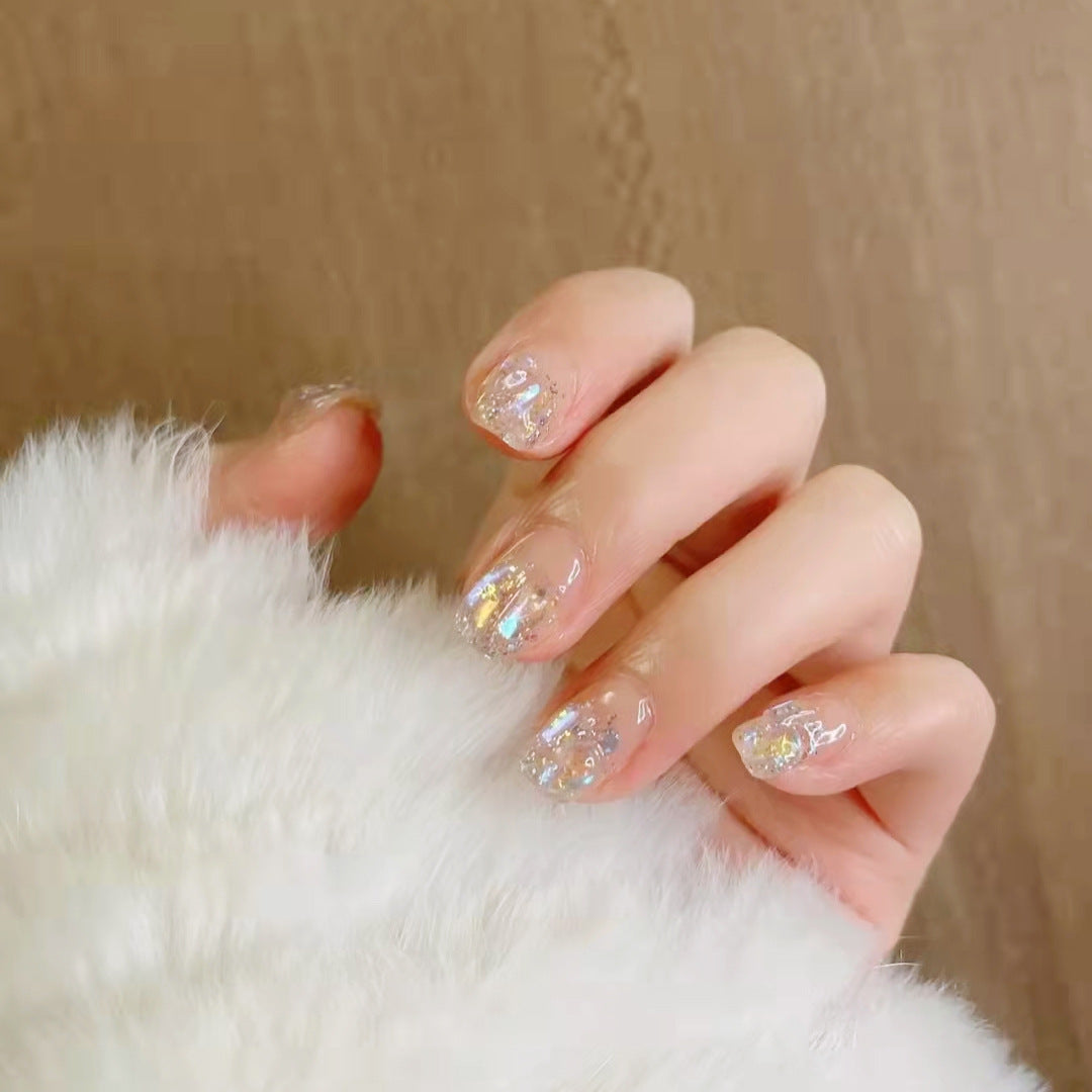 Glittering artificial nails with holographic accents Bowlift