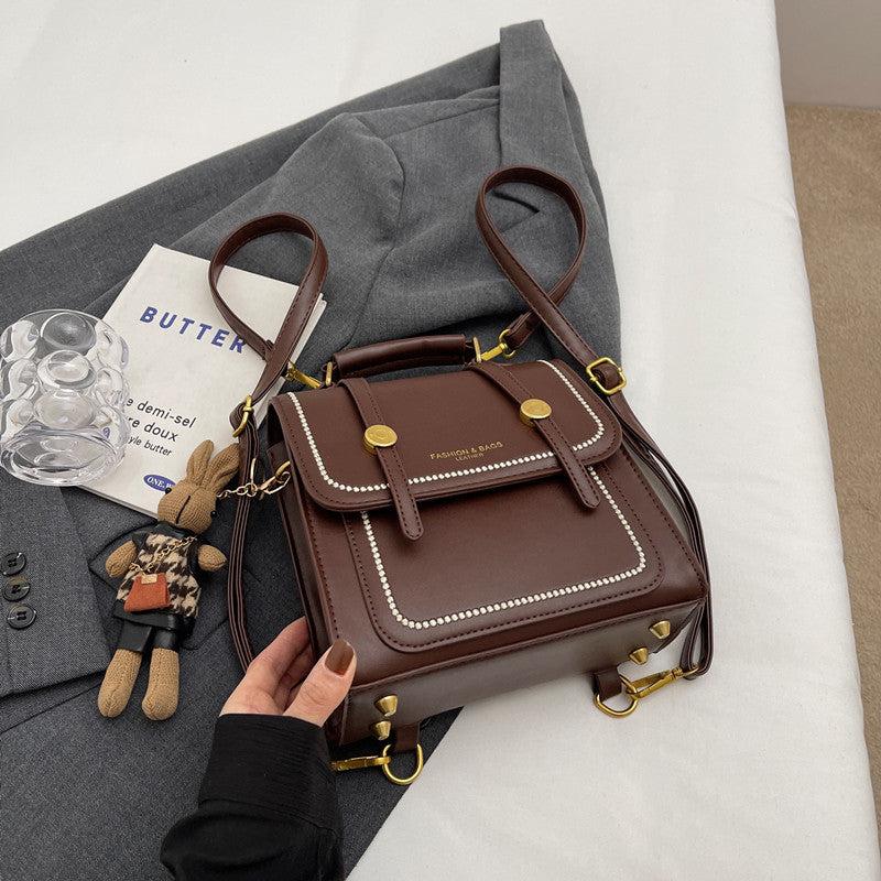Vintage-Inspired Structured Satchel Bag Bowlift