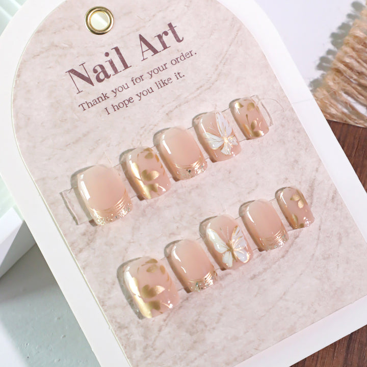 Artful nail design with leaf motifs Bowlift