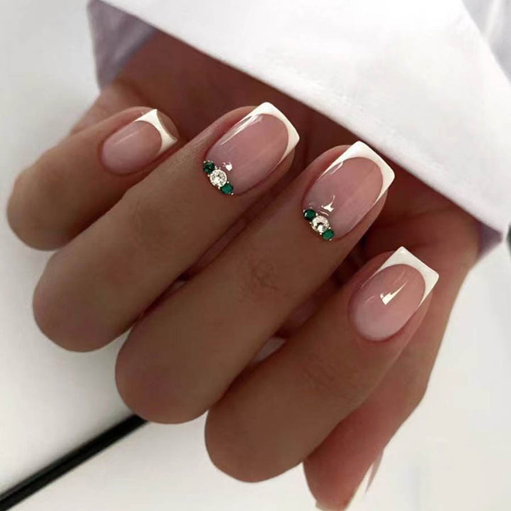 Art nail set with elegant French design and glittering accents Bowlift