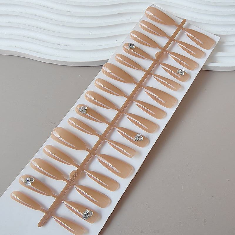 Acrylic nails with glamorous stone accents Bowlift
