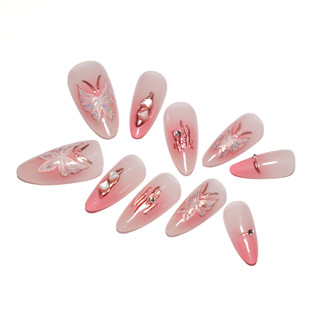 Artificial nail extensions with floral motifs and glitter accents Bowlift