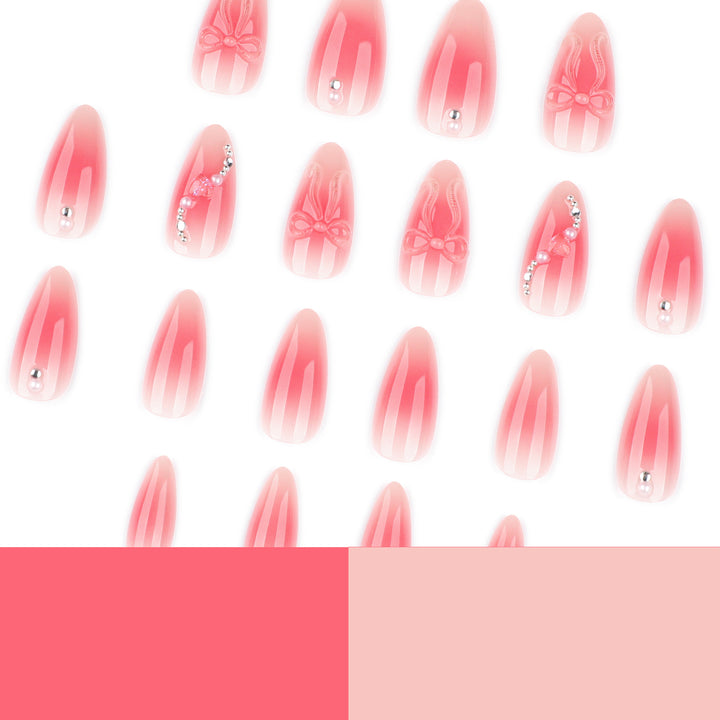 Artful nail extensions with delicate floral accents and glitter Bowlift