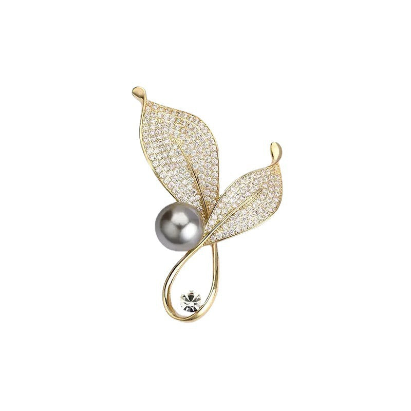 Elegant and Glamorous Brooch with Pearls and Crystals Bowlift