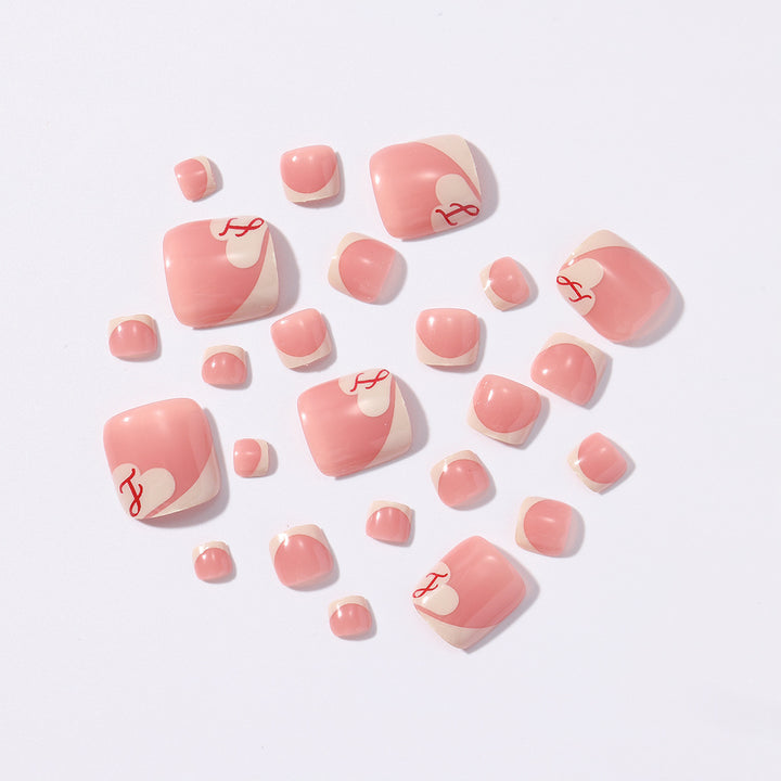 Artificial nail set with elegant French tips and romantic heart designs Bowlift