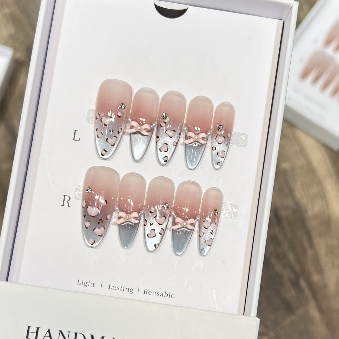 Decorative Press-On Nail Design with Bow Accents Bowlift