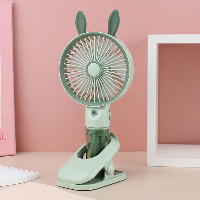 Cooling compact rechargeable clip-on misting handheld fan with detachable water reservoir and adjustable tilt Bowlift
