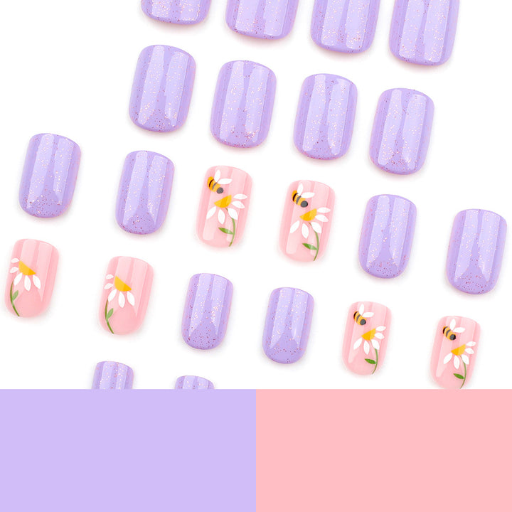 Artfully designed nail extensions with flower design Bowlift