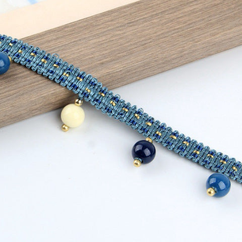 Decorative lace trim with colorful pendants Bowlift
