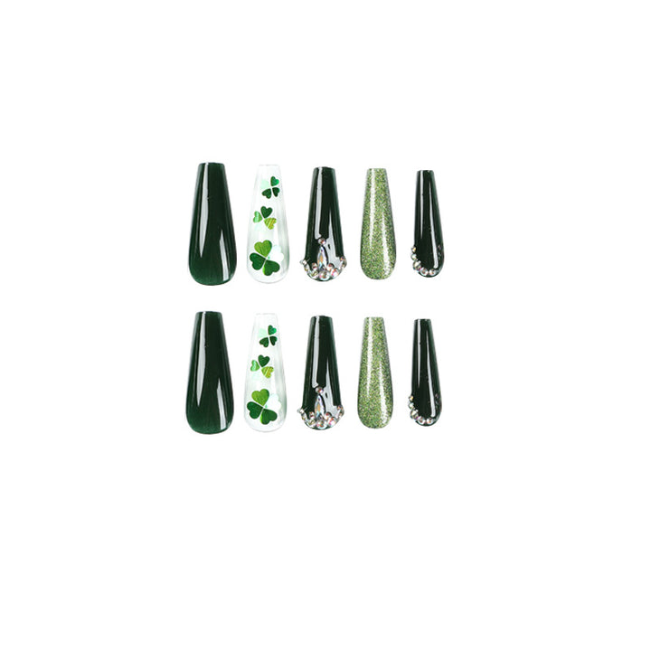 Artificial nail art with clover leaf motifs Bowlift