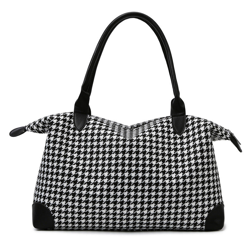 Fashionable handbag in timeless houndstooth pattern Bowlift