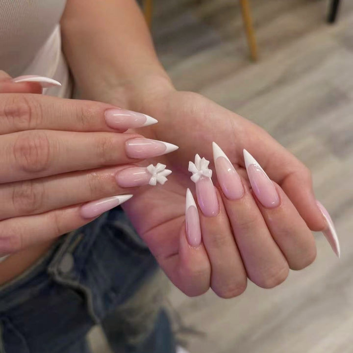 Acrylic nail set with elegant tips and 3D decorations Bowlift
