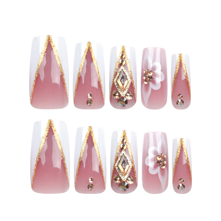 Artistic nail extensions with floral and glitter accents Bowlift