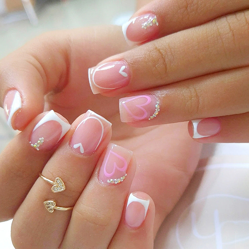Artificial nail set with glitter and heart motifs Bowlift
