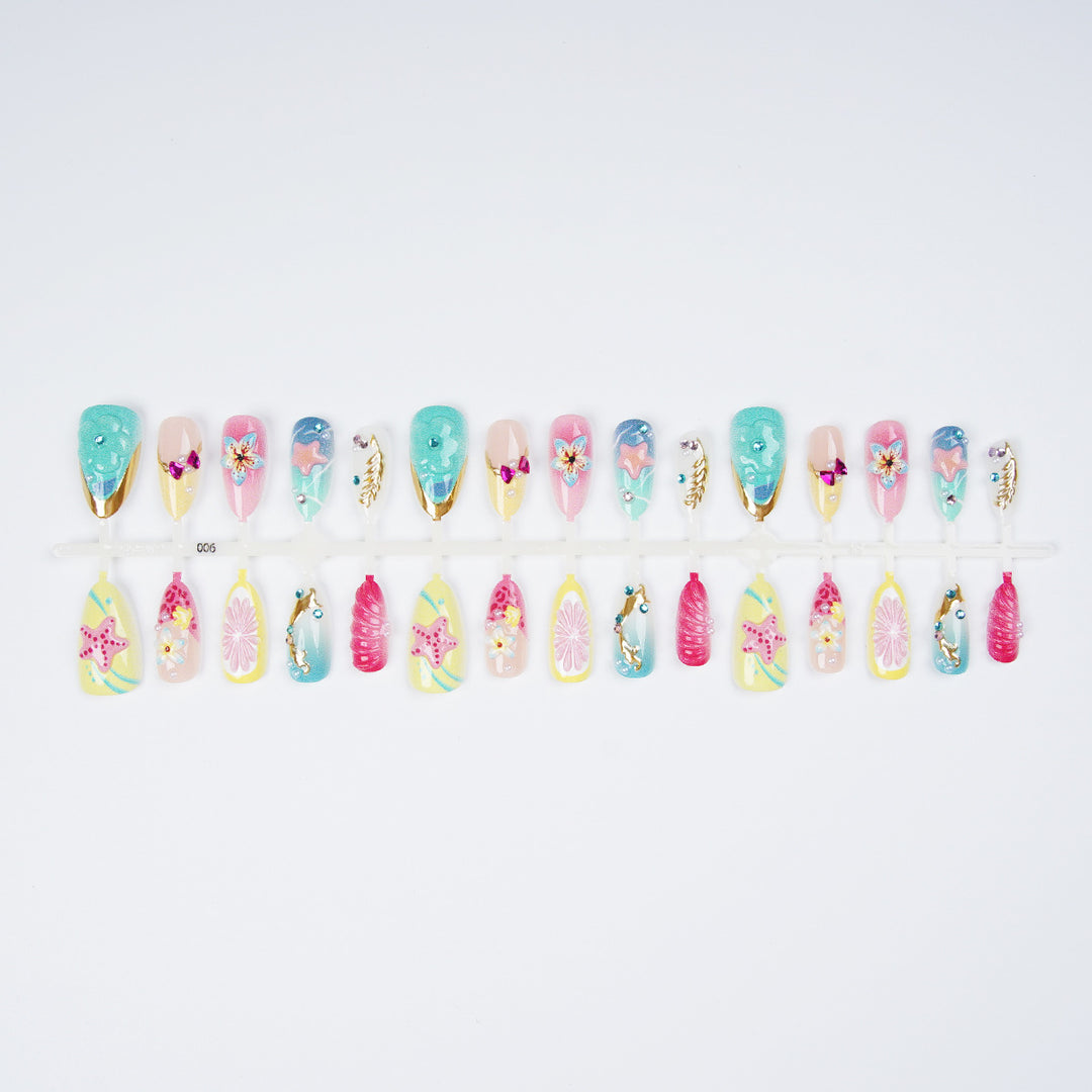 Colorful artificial nails with rhinestones Bowlift