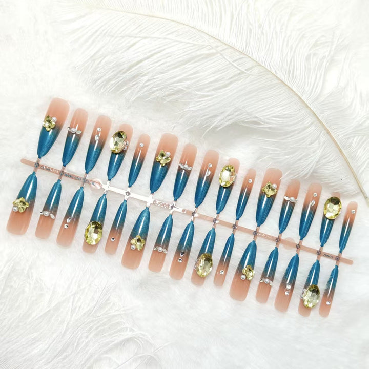 Artificial Nails in Elegant Stiletto Style with Sparkling Accents Bowlift