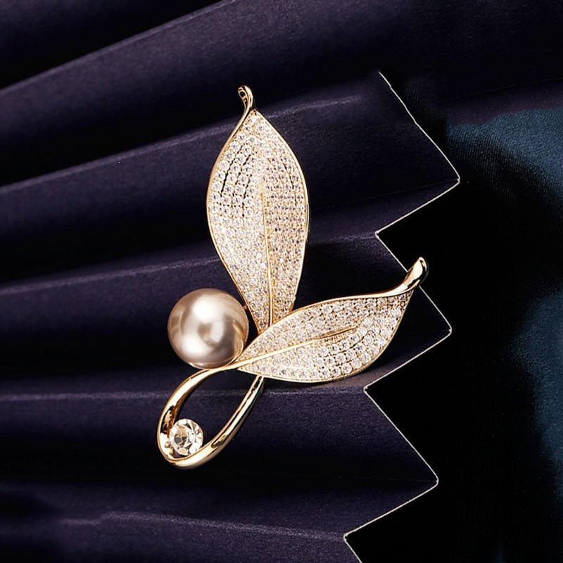 Elegant and Glamorous Brooch with Pearls and Crystals Bowlift