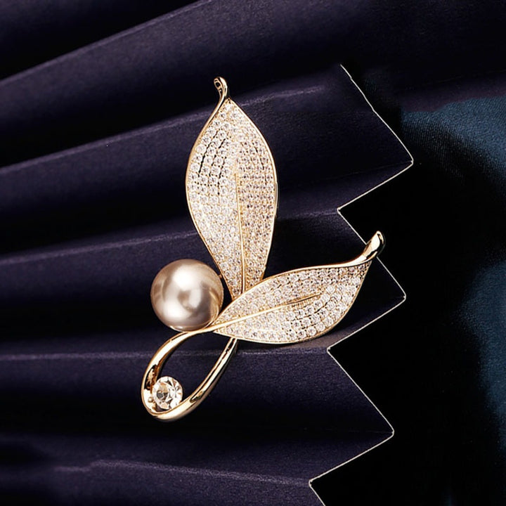 Elegant and Glamorous Brooch with Pearls and Crystals Bowlift