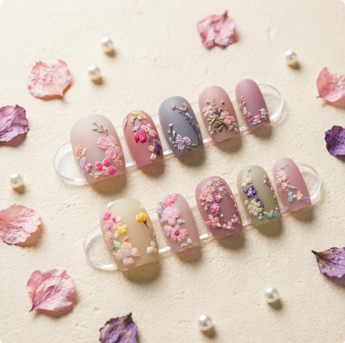 Art nail design with floral motifs Bowlift