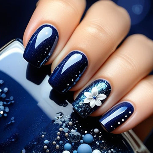Artificial nails in elegant glitter design with floral embellishments Bowlift