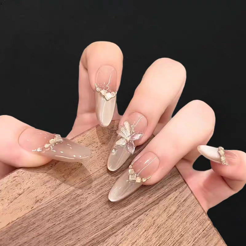 Artificial nails with elegant, adorned tips Bowlift
