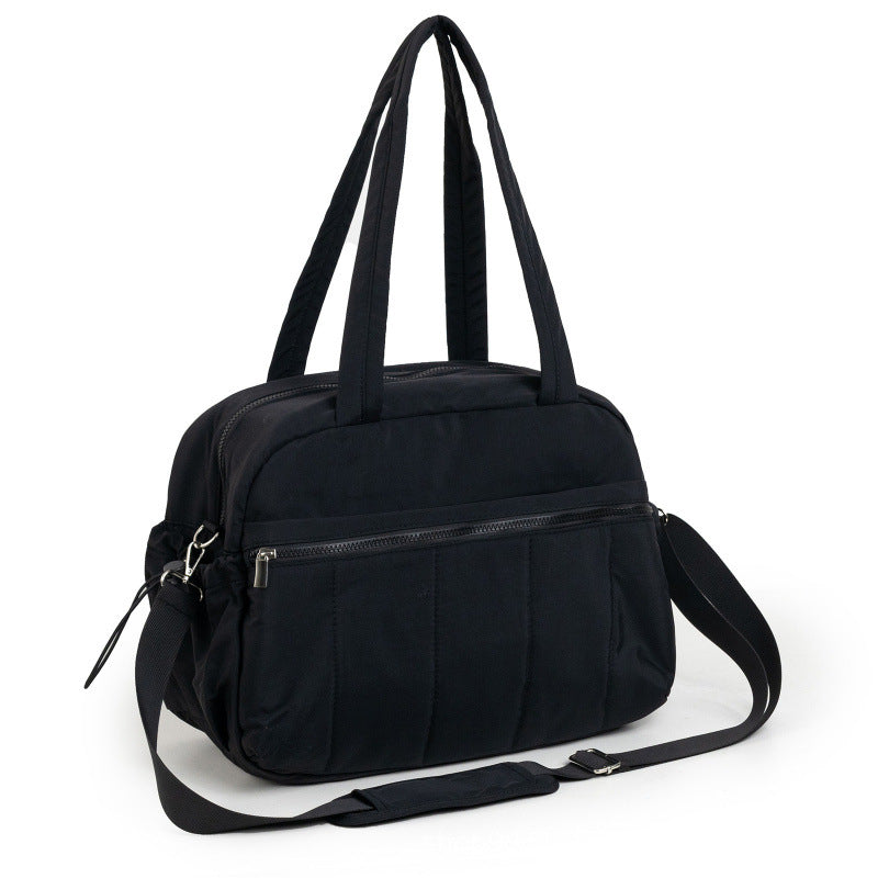 Padded travel bag with practical outer pockets Bowlift