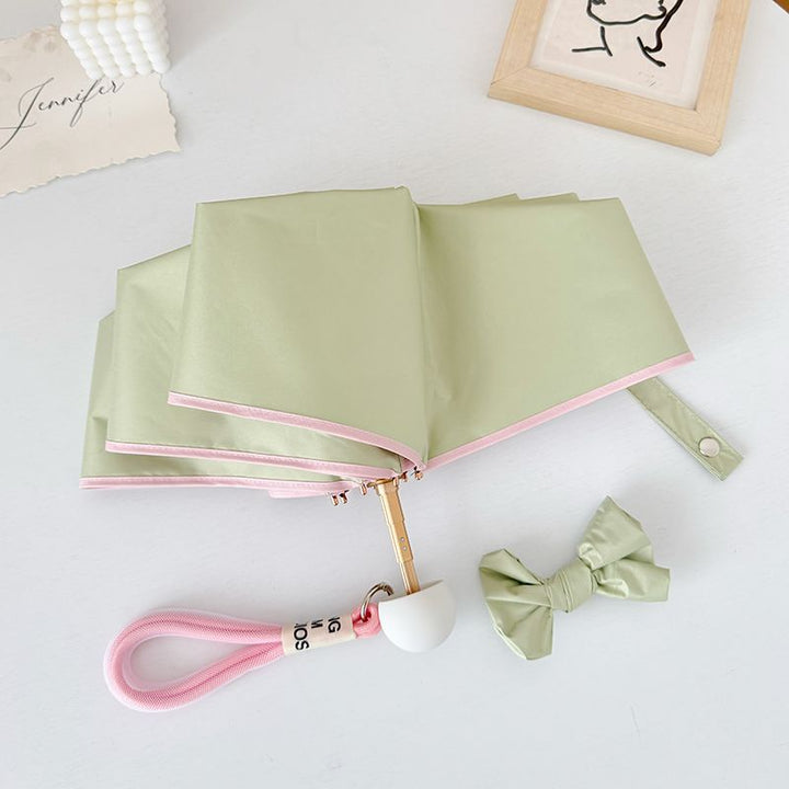 Ladies compact folding umbrella with practical handbag loop Bowlift