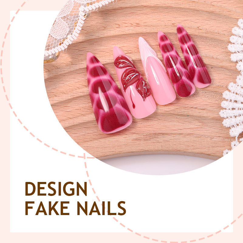 Artificial nail creations with creative patterns and glitter accents Bowlift