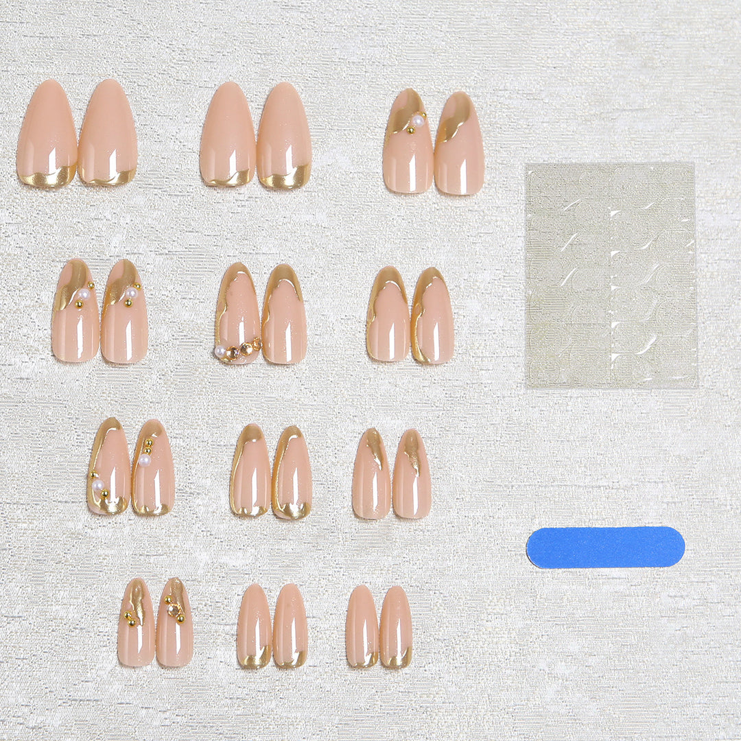 Elegant artificial nails with golden accents Bowlift