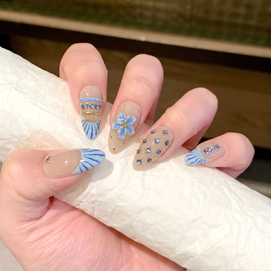 Decorative Nail Art Set with Floral and Gemstone Accents Bowlift