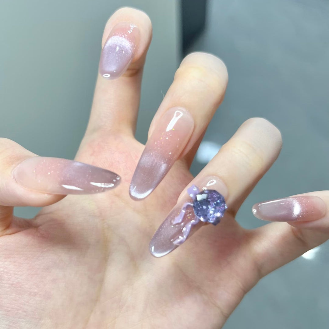Artistic Ombre Press-On Nail Design with Crystal Accent Bowlift