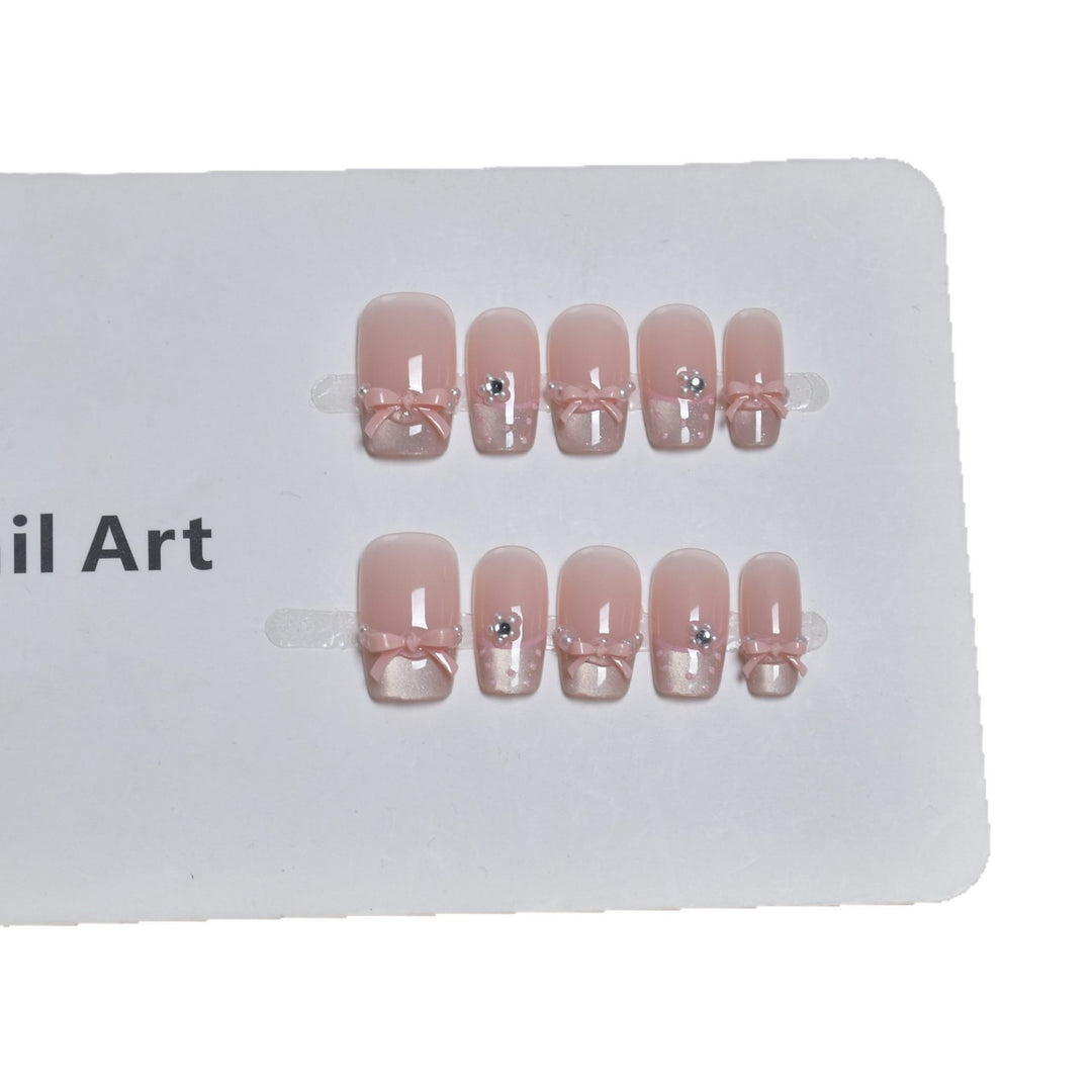 Elegant French Tip Press-On Nail Art with Bow Accents Bowlift