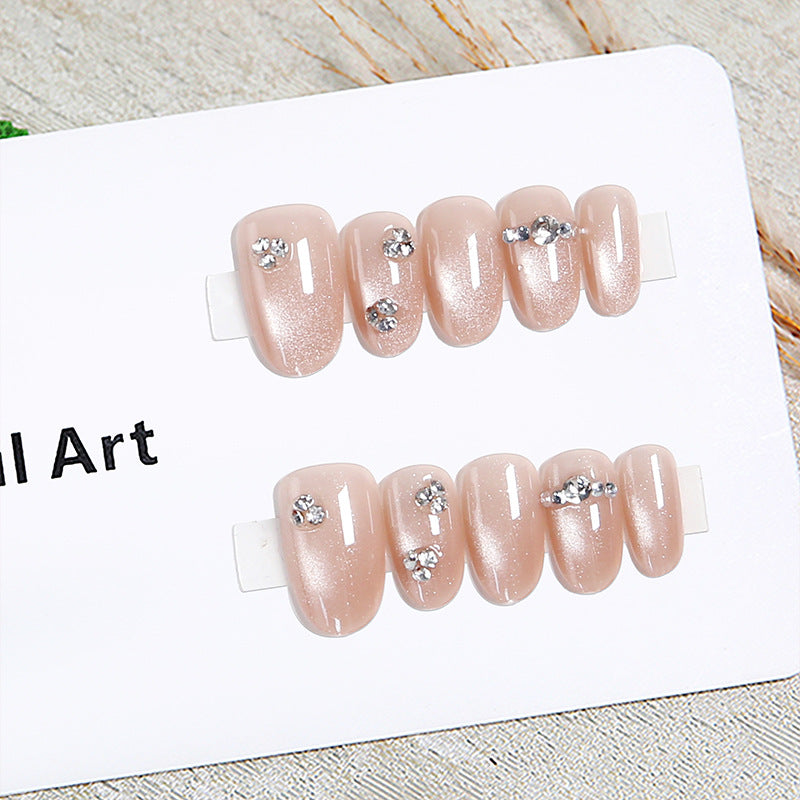 Artificial nail set with elegant rhinestone embellishments Bowlift
