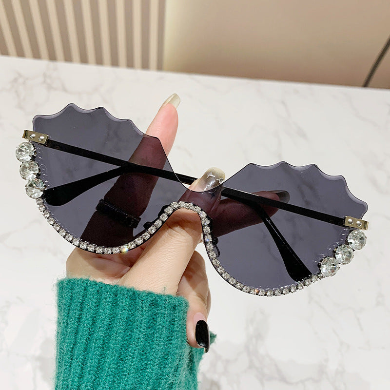 Women's extravagant sunglasses with sparkling accent and unique design Bowlift