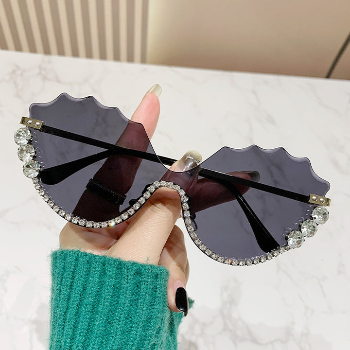 Women's extravagant sunglasses with sparkling accent and unique design Bowlift